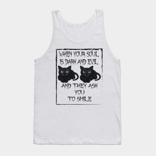 When your soul is dark and evil,and they ask you to smile. Tank Top